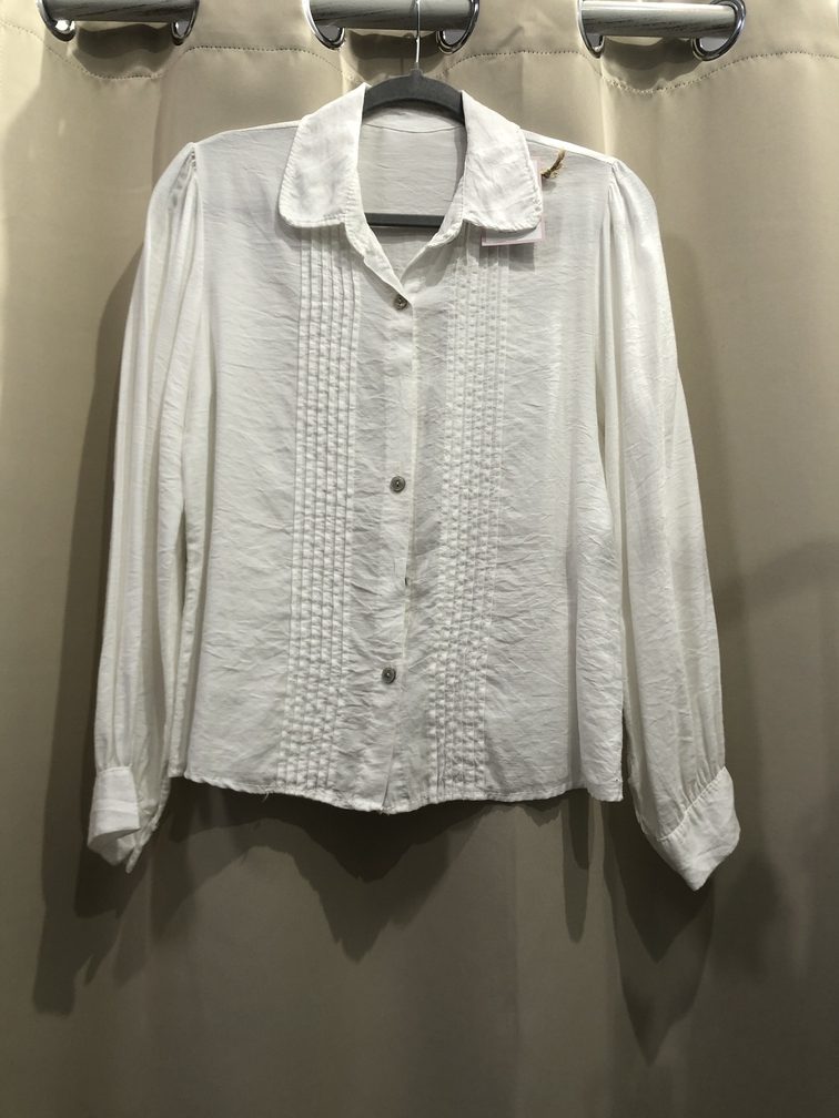 Camisa blanca manga larga. Talla unica. Precio 25E