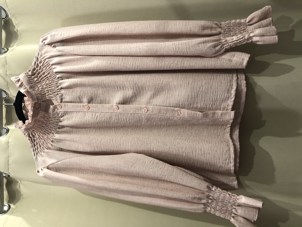 Camisa rosa empolvado con cuello de nido manga larga. Talla unica. Precio 30E