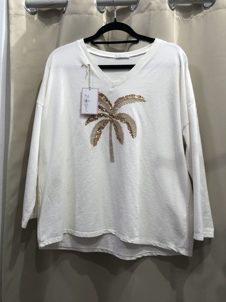 Camiseta blanca manga larga con motivo palmera en lentejuelas. Talla unica. Precio 22E