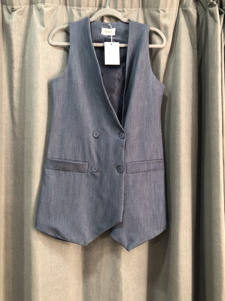 Chaleco azul largo. Talla X S. Precio 35E