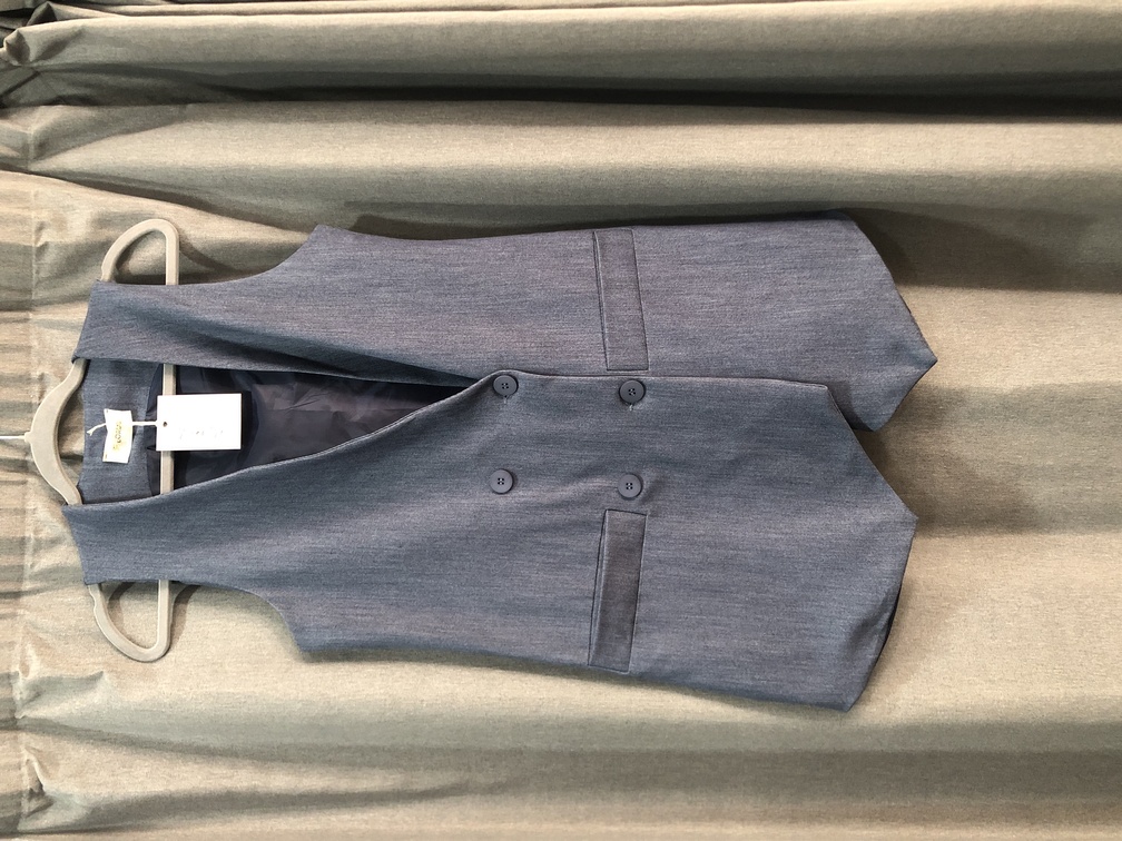 Chaleco azul largo. Talla X S. Precio 35E